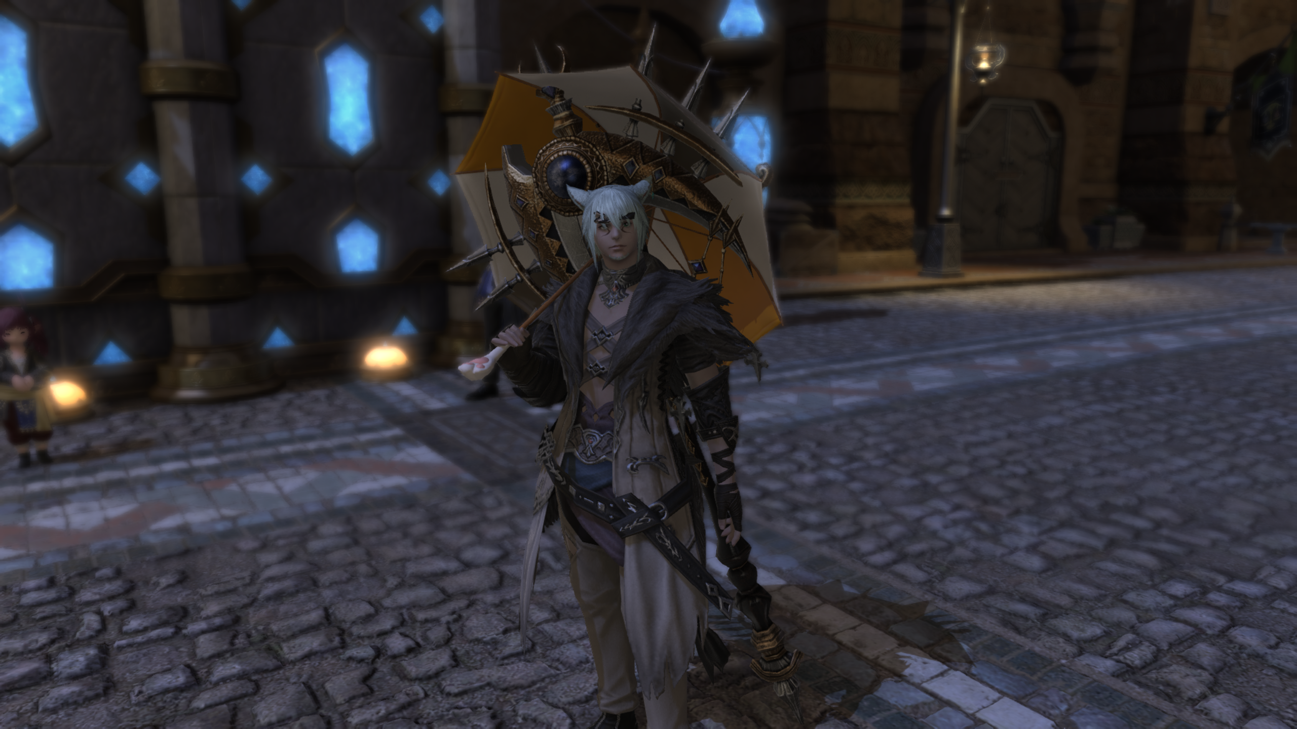 My cat boy holding an umbrella.